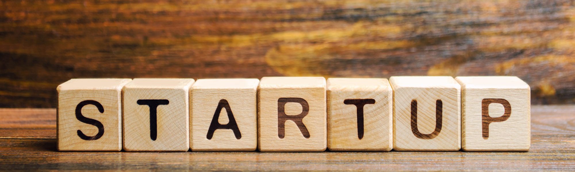 Wooden blocks with the word Startup